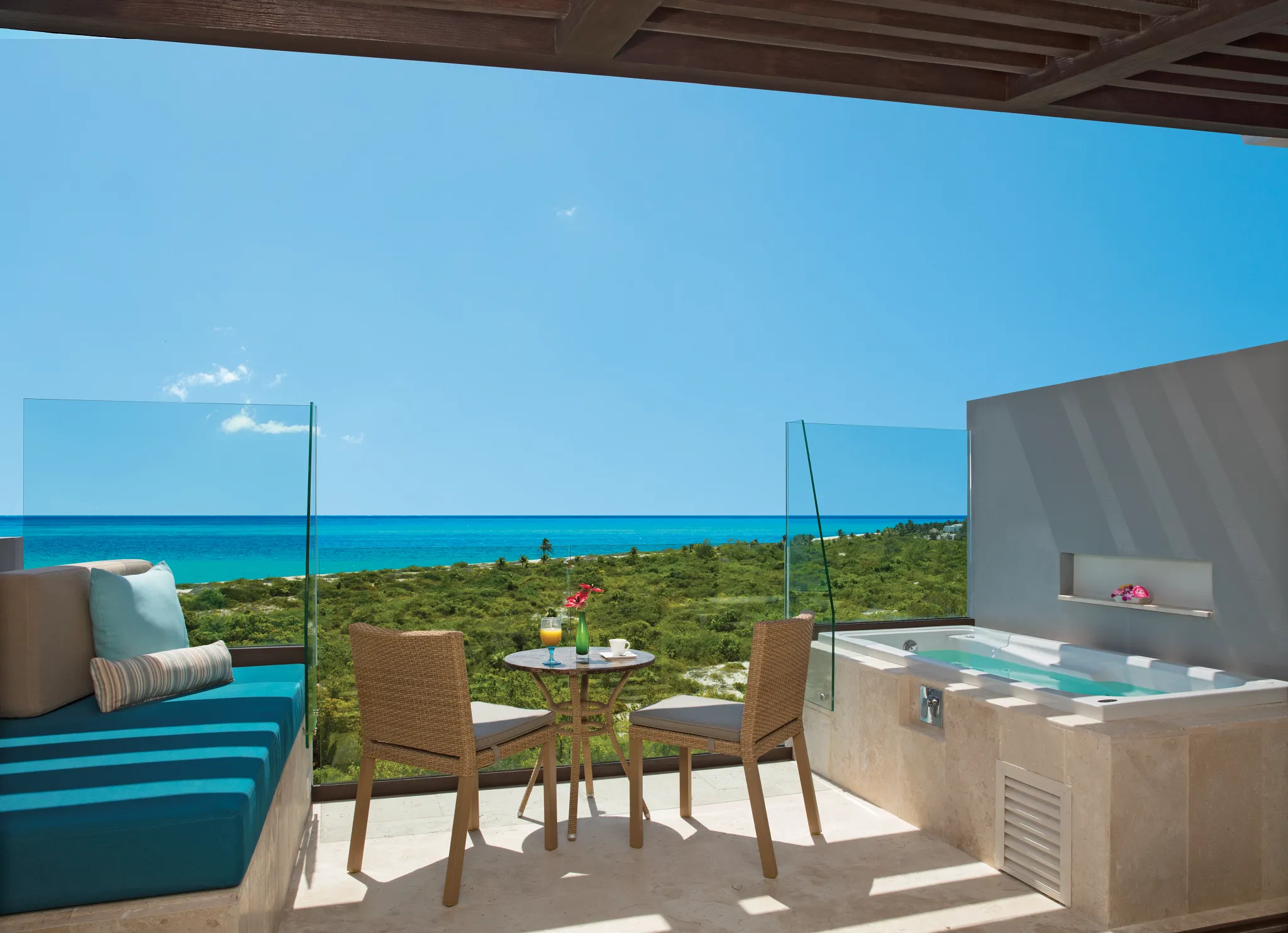 Terrace with a hot tub looking straight out at the Caribbean Sea