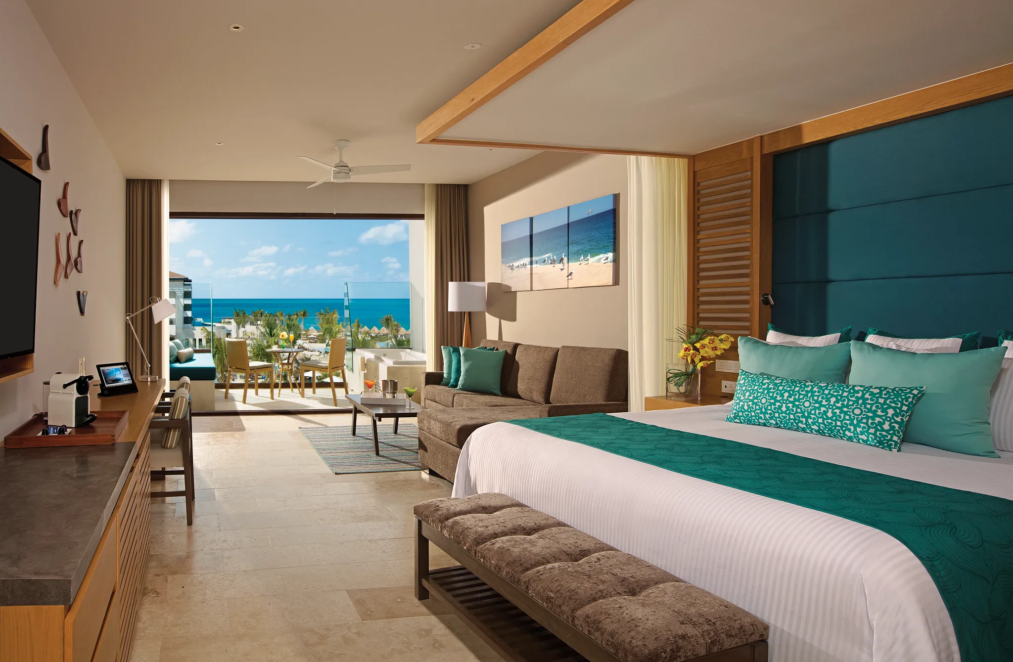 Junior suite terrace with the Caribbean Sea framed off to the side