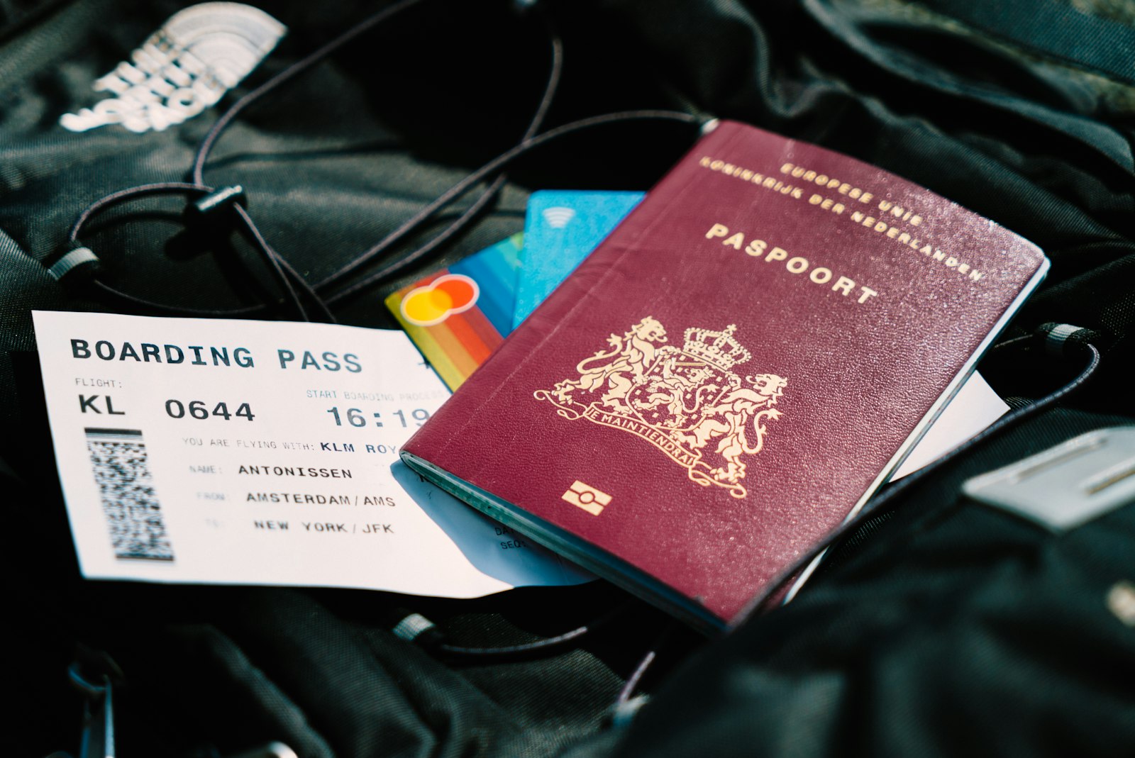 Passport and boarding pass on a bag