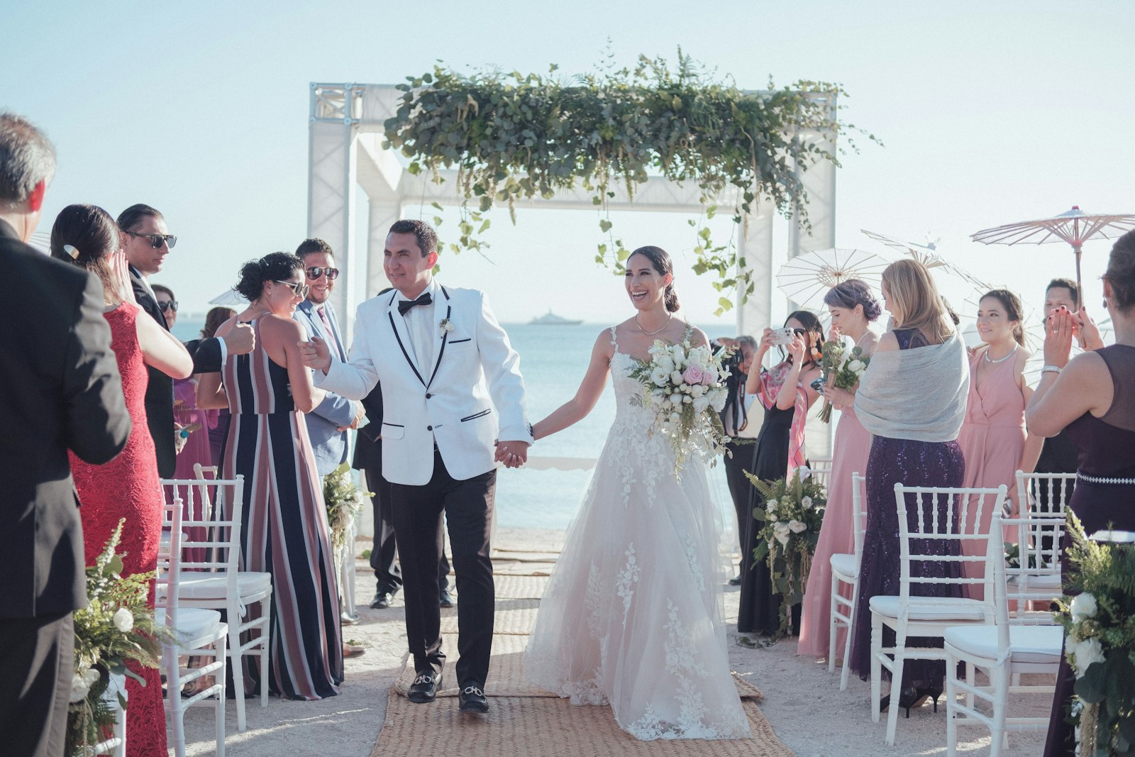 Bride and groom walking down the aisle
